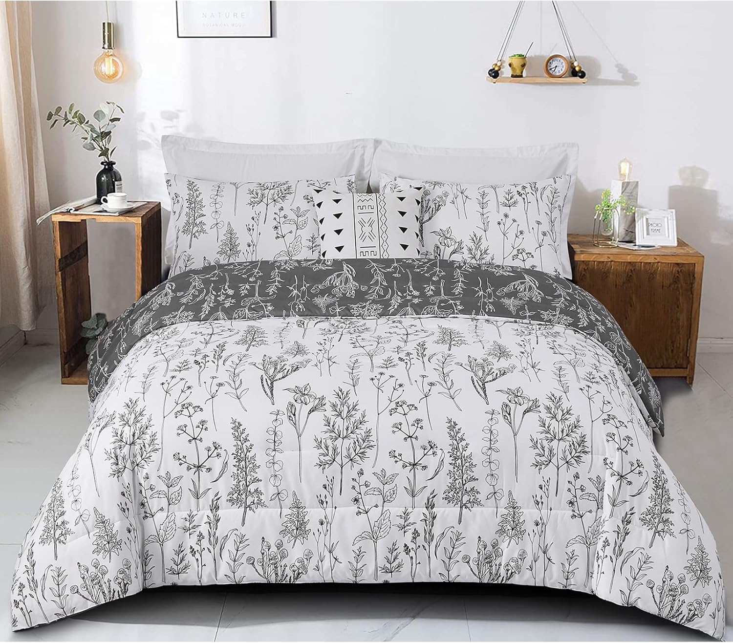 Floral Comforter Set, King Size, Black White Floral Pattern Reversible Bedding on a styled bed with wooden nightstands.