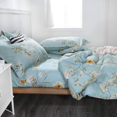 Floral Soft Comforter Set, Queen/King Size, Quilted Bedding for All Seasons in light blue with floral pattern on wooden bed and white nightstand