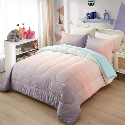 Girls Comforter Set, Queen Size, Ombre Blue Pink Rainbow 3-Piece Bedding Collection on a made bed in a bright bedroom