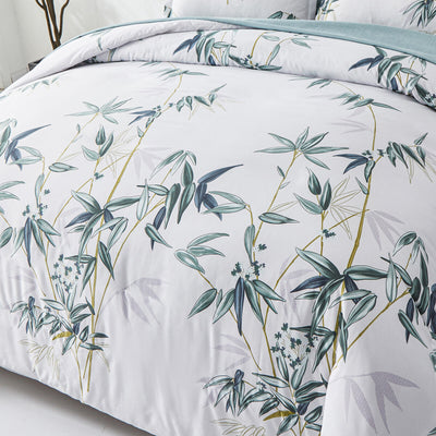 Floral Leaves Comforter Set, King Size, Quilted Bedding with Pillowcases featuring green leaf pattern on white background in bedroom setting