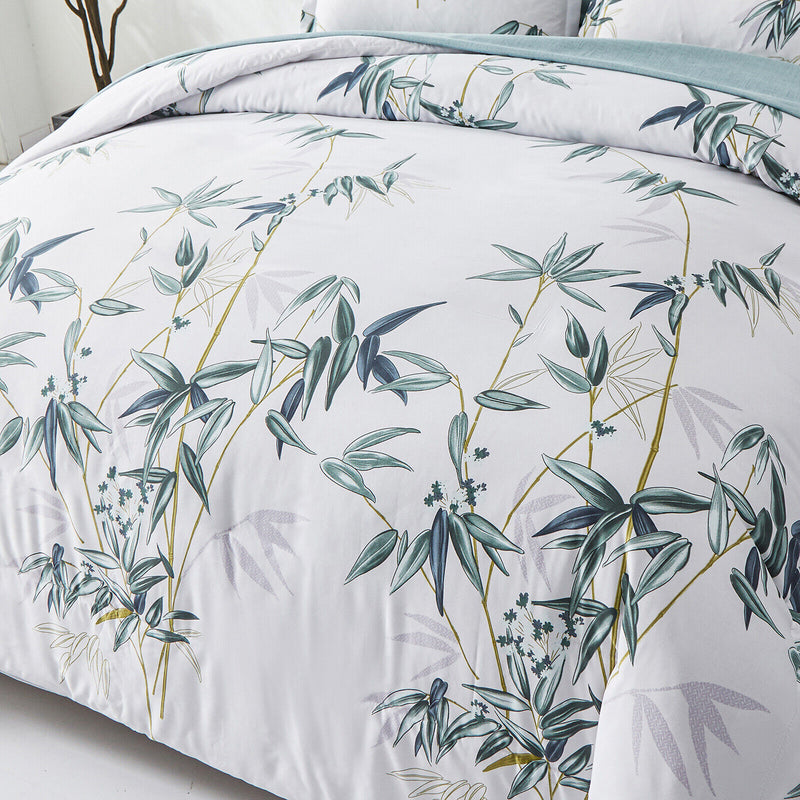 Floral Leaves Comforter Set, King Size, Quilted Bedding with Pillowcases featuring green leaf pattern on white background in bedroom setting