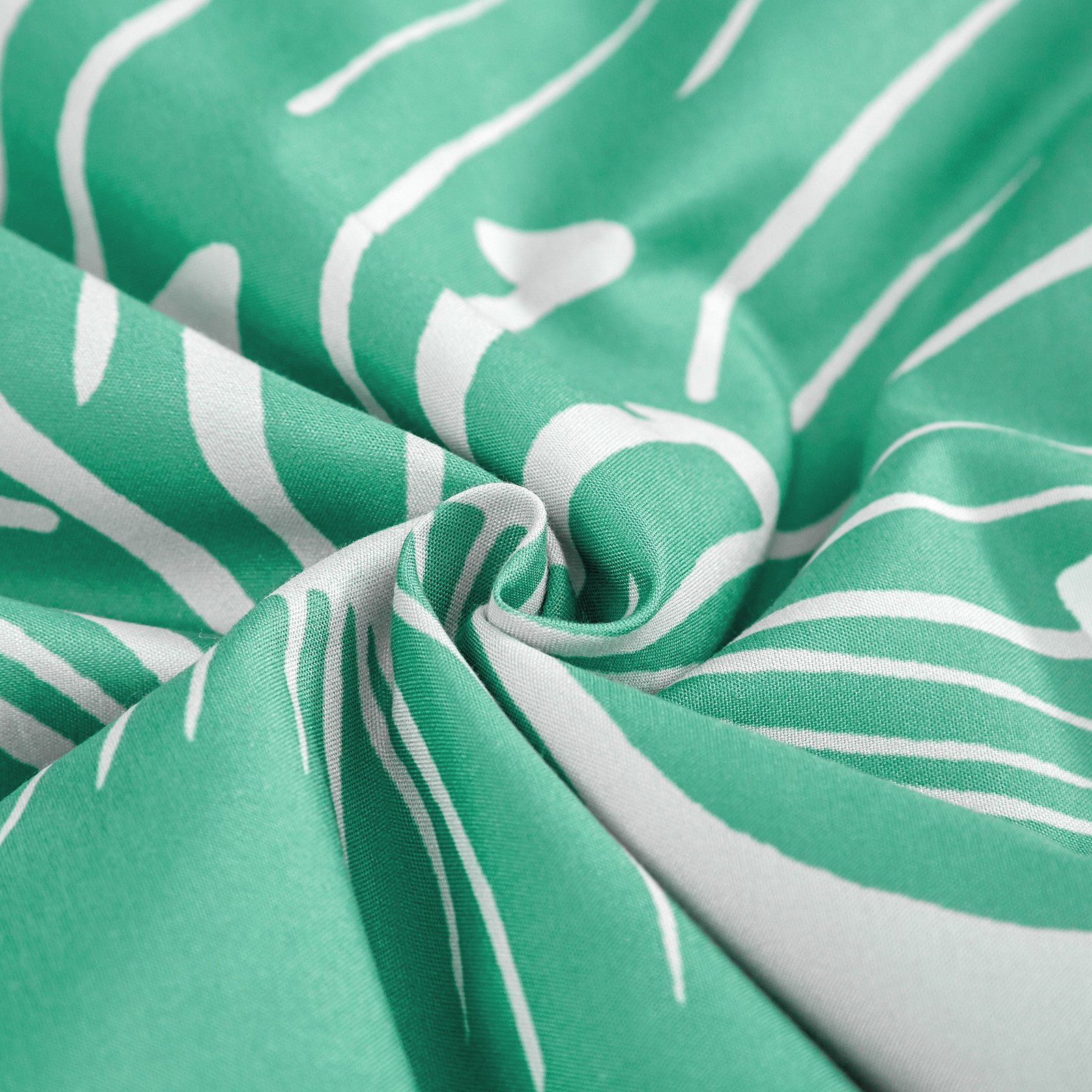 Close-up of green and white fabric pattern from Floral Comforter Set, King Size, Green Floral 3-Piece Bedding, Lightweight Microfiber