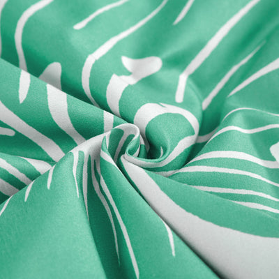 Close-up of green and white fabric pattern from Floral Comforter Set, King Size, Green Floral 3-Piece Bedding, Lightweight Microfiber