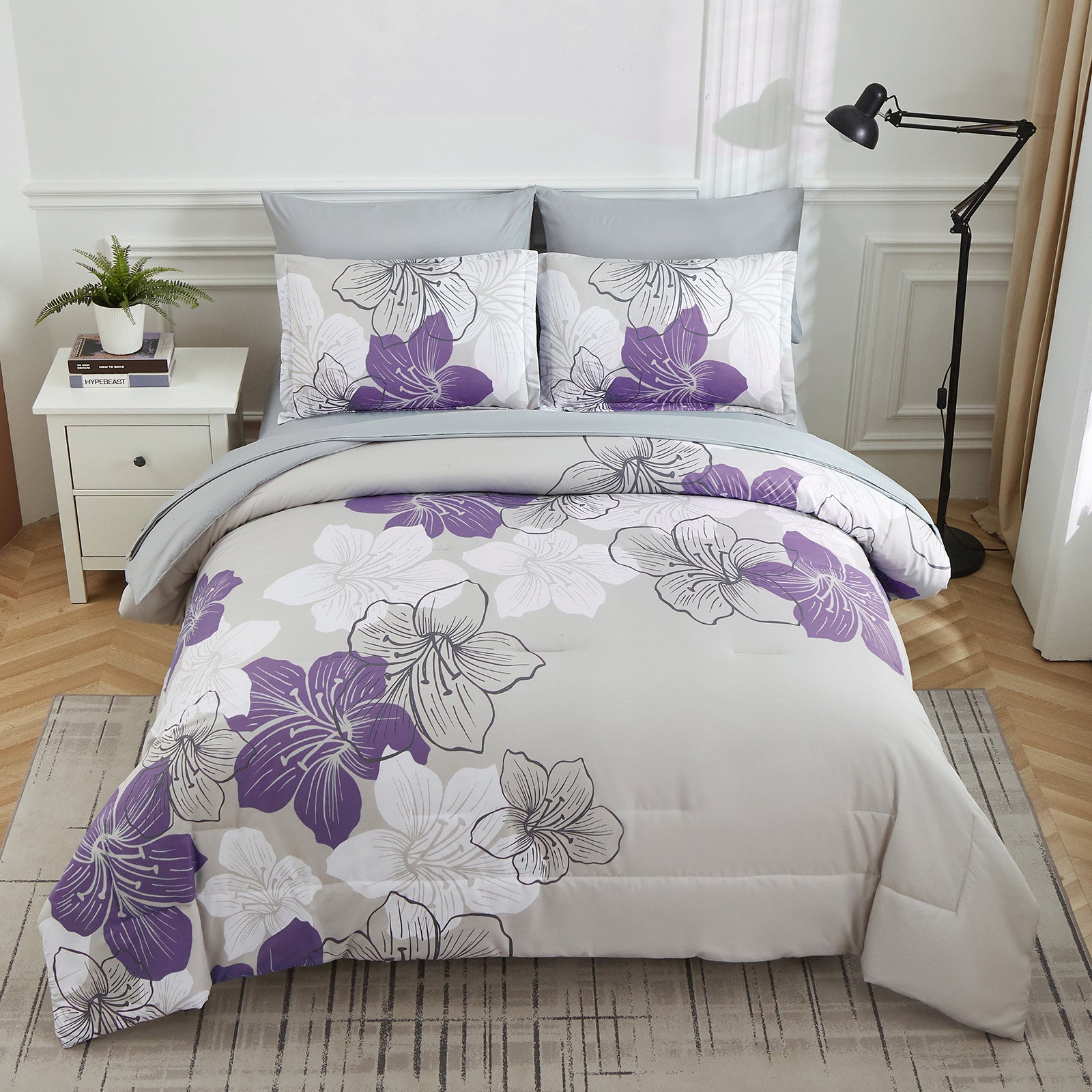 Floral Comforter Set, King Size, Purple Floral 3-Piece Bedding, Lightweight Microfiber on bed with nightstand and lamp in bedroom setting