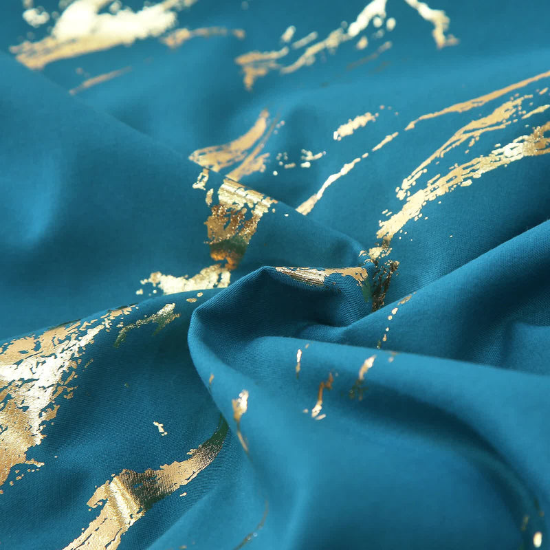 Close-up of teal fabric with gold accents from the Cozy Cloud 3 Teal ‑Piece Comforter Bundle – Instagram‑Ready Bedroom