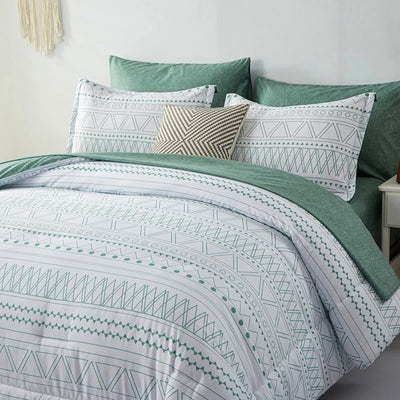 Boho Vibes Bedding Set – 3‑Piece Comforter & Pillow Covers with geometric print and green accent pillows in bedroom setting