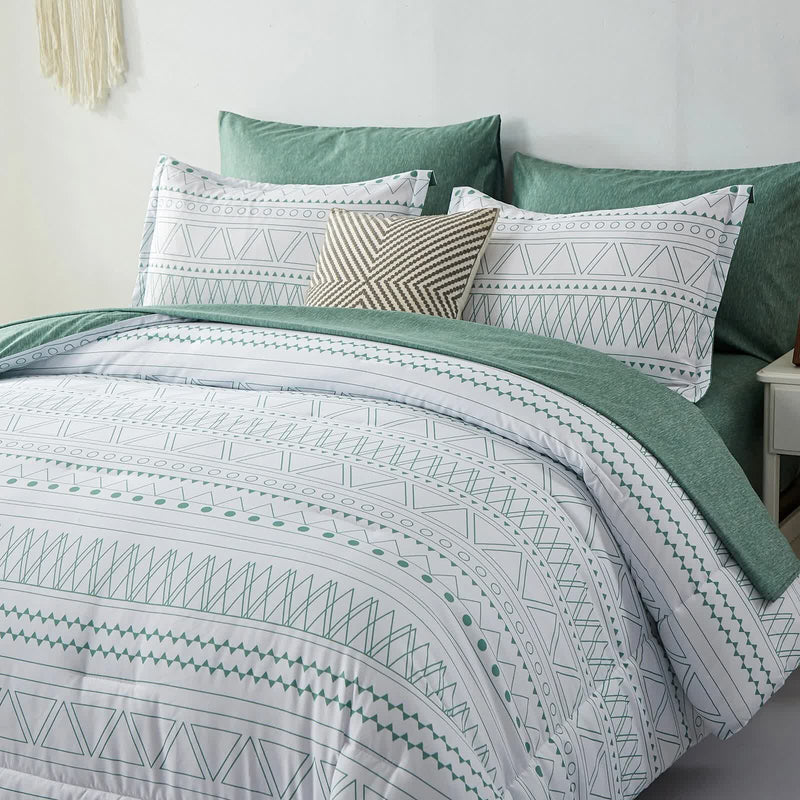 Boho Vibes Bedding Set – 3‑Piece Comforter & Pillow Covers with geometric print and green accent pillows in bedroom setting
