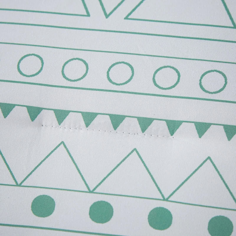 Close-up of geometric pattern on fabric from Boho Vibes Bedding Set – 3‑Piece Comforter & Pillow Covers by Bedzy