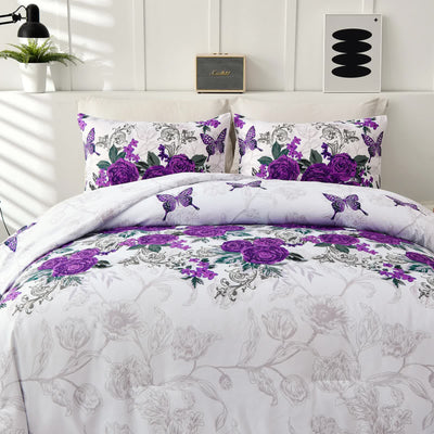 Luxe Loft Purple rose Quilted Comforter & Shams – Trending 3‑Piece Set with floral and butterfly design on white bed in bedroom