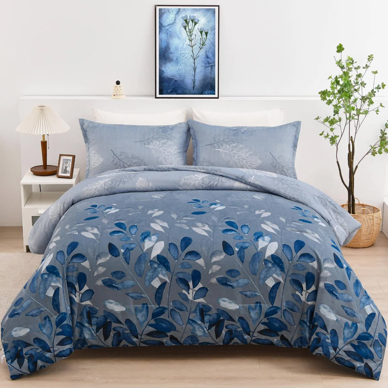GlowUp Bedroom Comforter – 3‑Piece Insta‑Aesthetic Set in blue with botanical print, shown on bed in modern bedroom setting