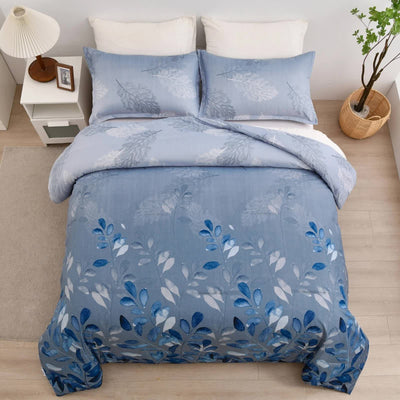 GlowUp Bedroom Comforter – 3‑Piece Insta‑Aesthetic Set in blue with floral pattern on queen bed with bedside table and lamp