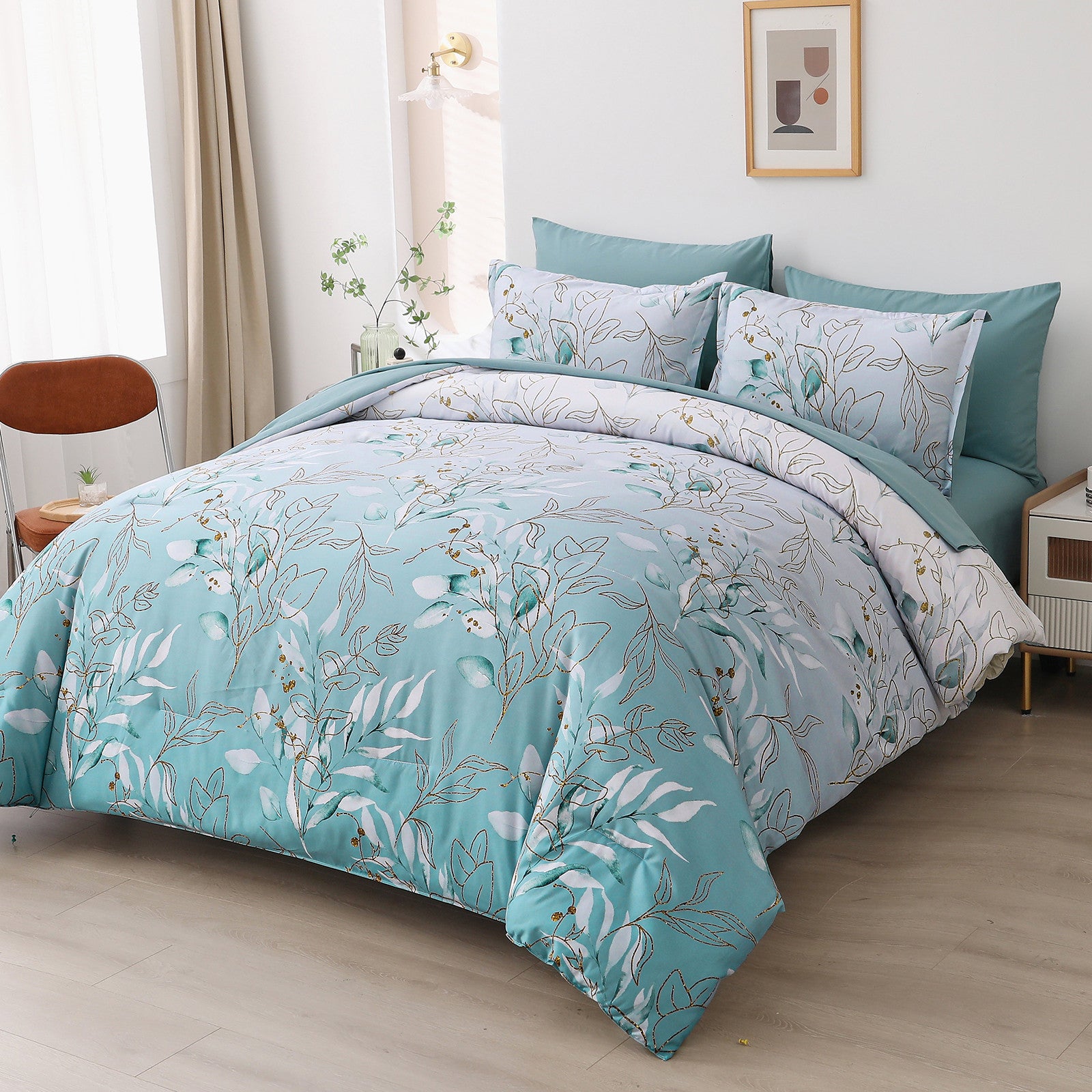 Soft Floral Leaf Comforter Set, King Size, Quilted Cozy Bedding with Pillowcases in blue with botanical print on a made bed in bedroom