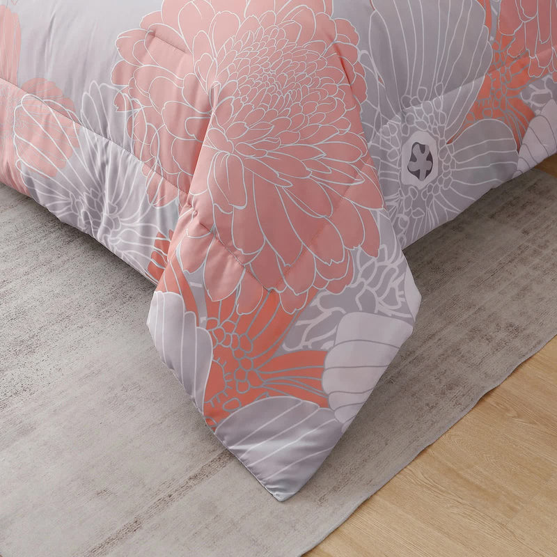 Zen Retreat Quilted Comforter Bundle – 3‑Piece Serenity Style with floral pattern on a bed in a bedroom setting