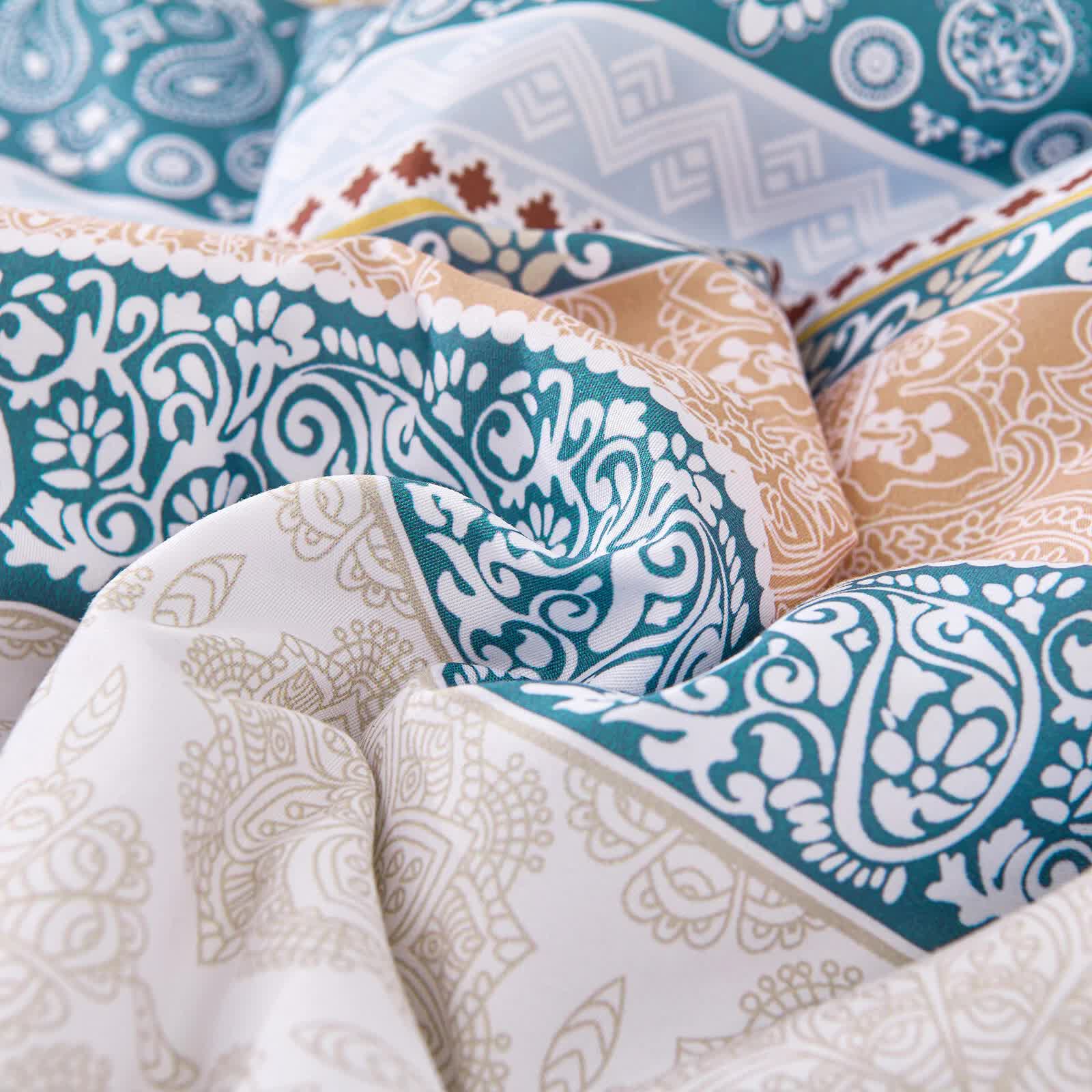 Close-up of Luxe Loft Boho Quilted Comforter & Shams – Trending 3‑Piece Set with detailed multicolor boho patterns