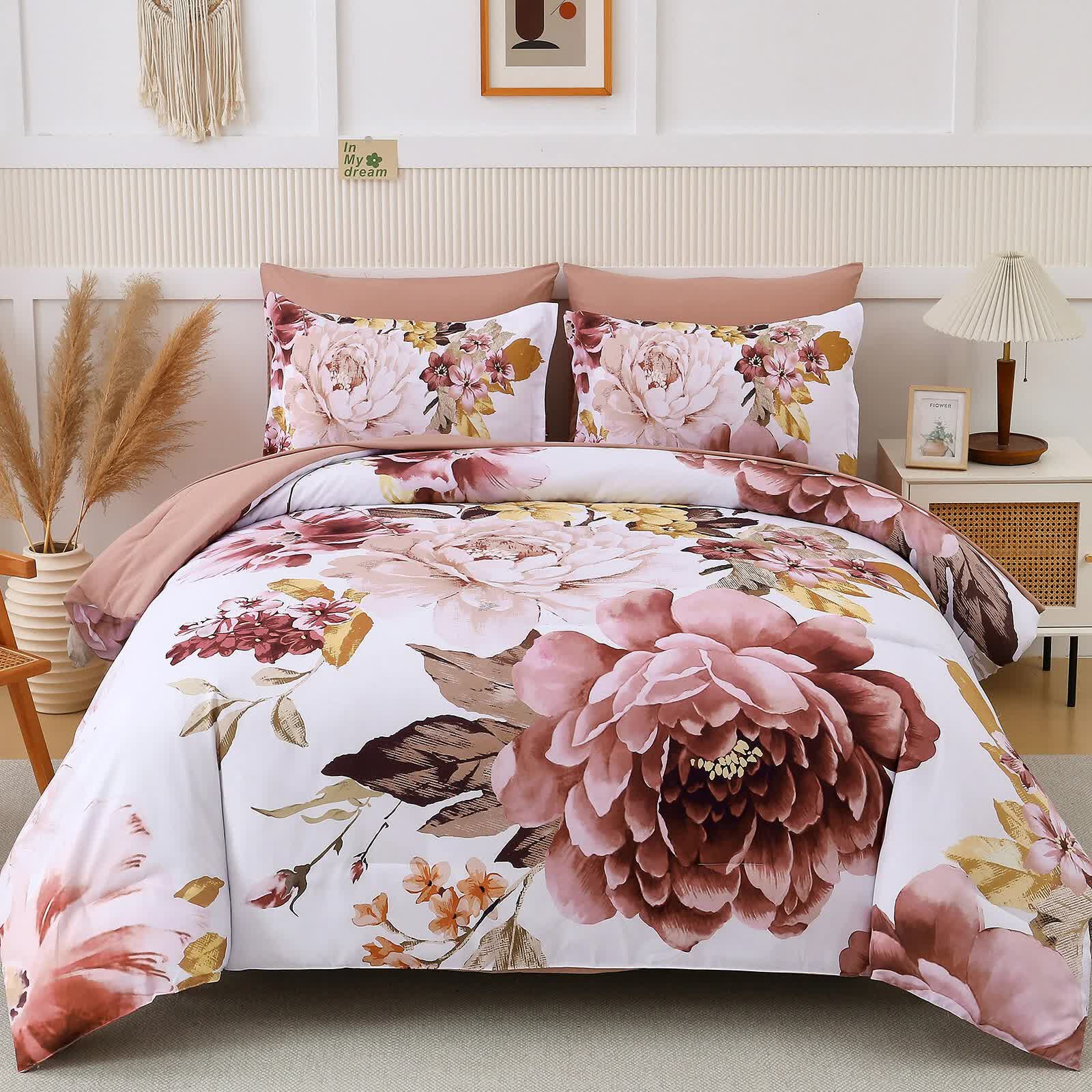 Pure Haven Pink floral 3‑Piece Comforter Set with large rose patterns on white background, styled in bedroom setting