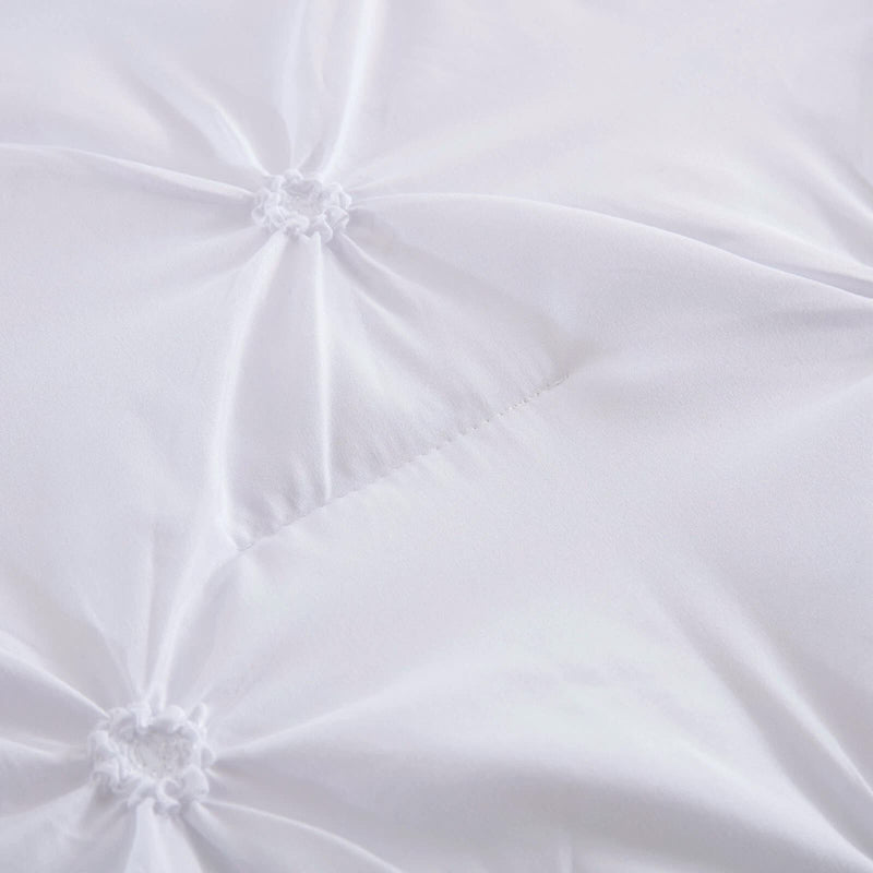 Minimal Mood white Comforter Collection – Modern 3‑Piece Set close-up showing soft quilting and tufted design detail on white fabric