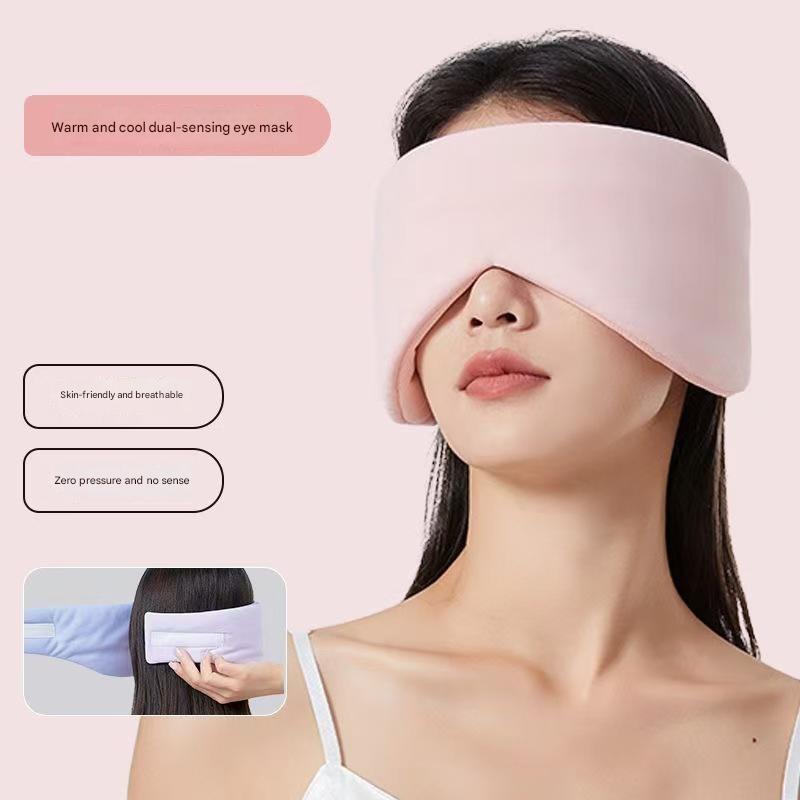 Pink Reversible All-Season Sleep Mask - Cooling & Warming with Sound Muffling Ear Covers worn by woman with dual-sensing feature