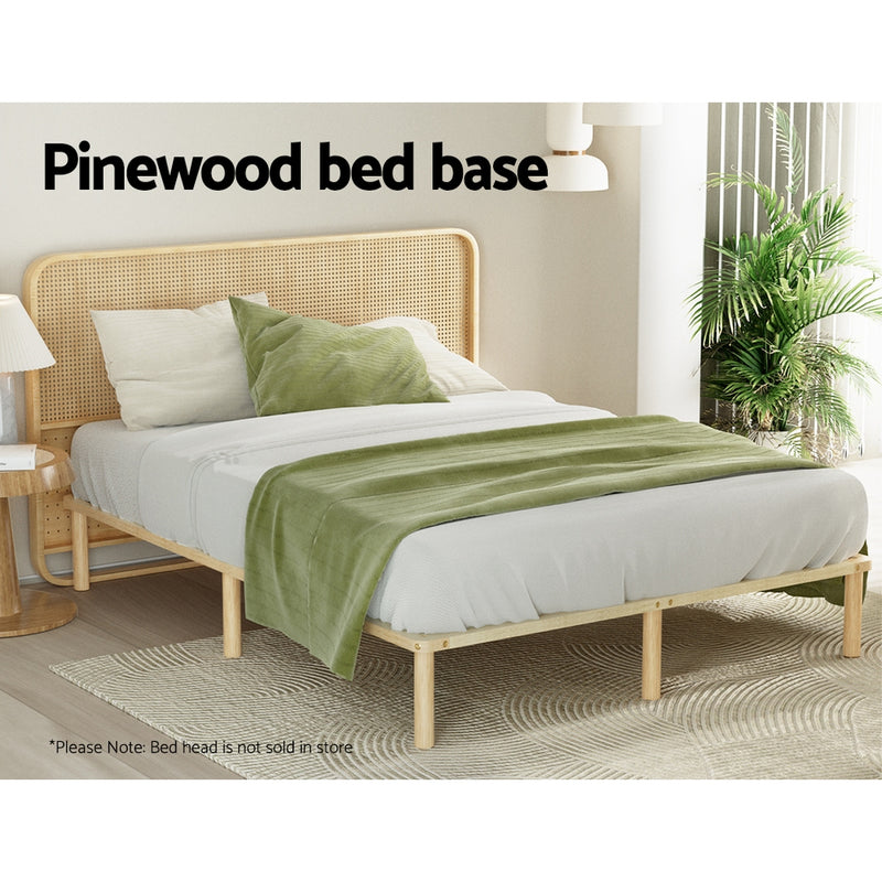 Amba Minimalist Double Wooden Bed Frame Pine with natural pinewood finish, simple design, and green bedding in a bright bedroom