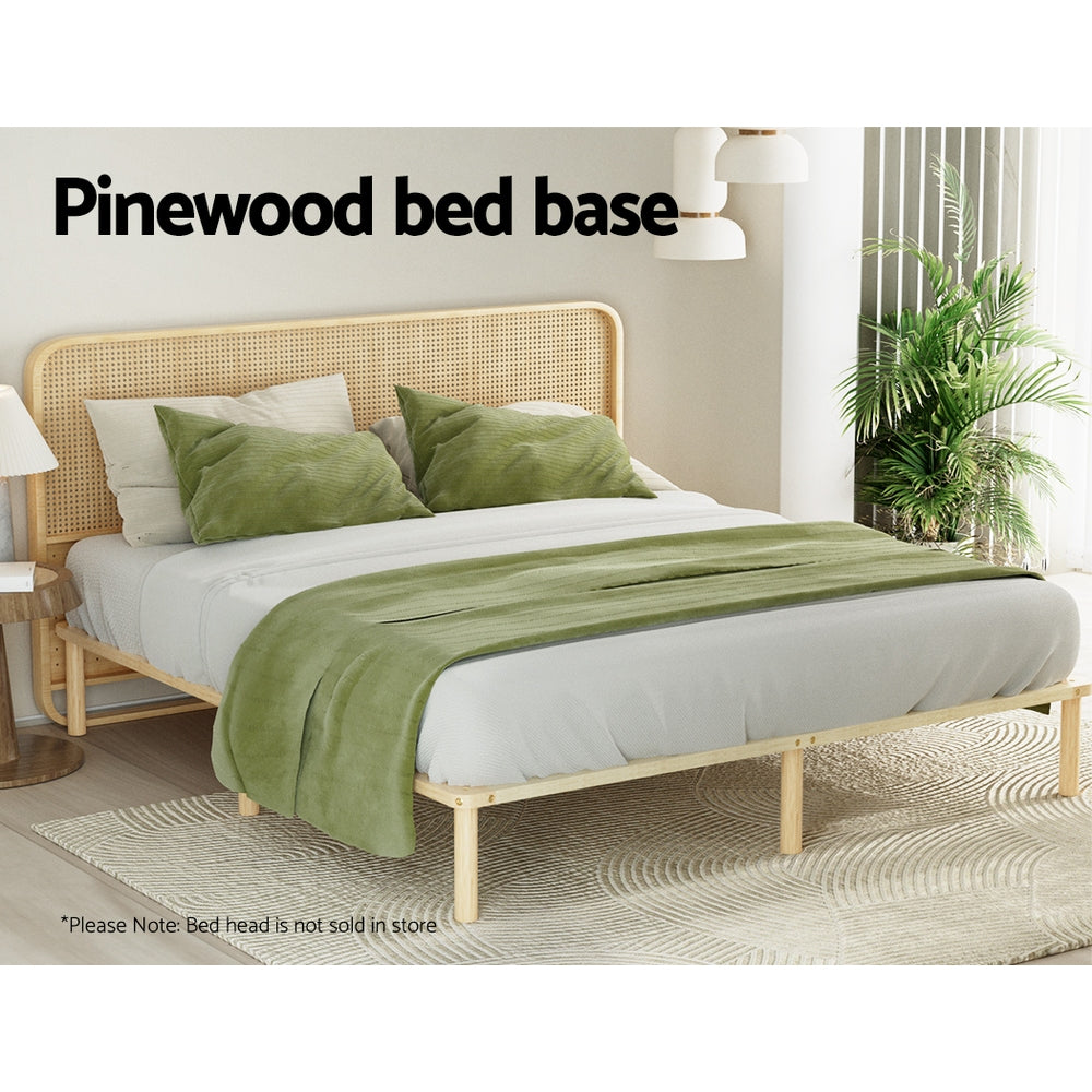 Amba Minimalist King Wooden Bed Frame Pine with pinewood base, shown in styled bedroom setting with green bedding and pillows