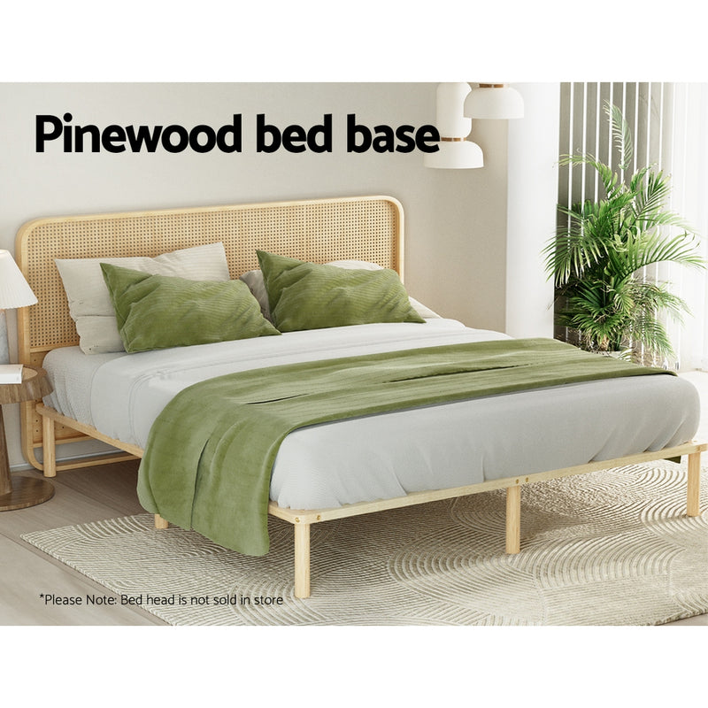 Amba Minimalist King Wooden Bed Frame Pine with pinewood base, shown in styled bedroom setting with green bedding and pillows