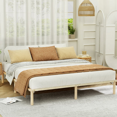 Amba Minimalist King Wooden Bed Frame Pine with natural wood finish in a bright bedroom setting with quilt and pillows