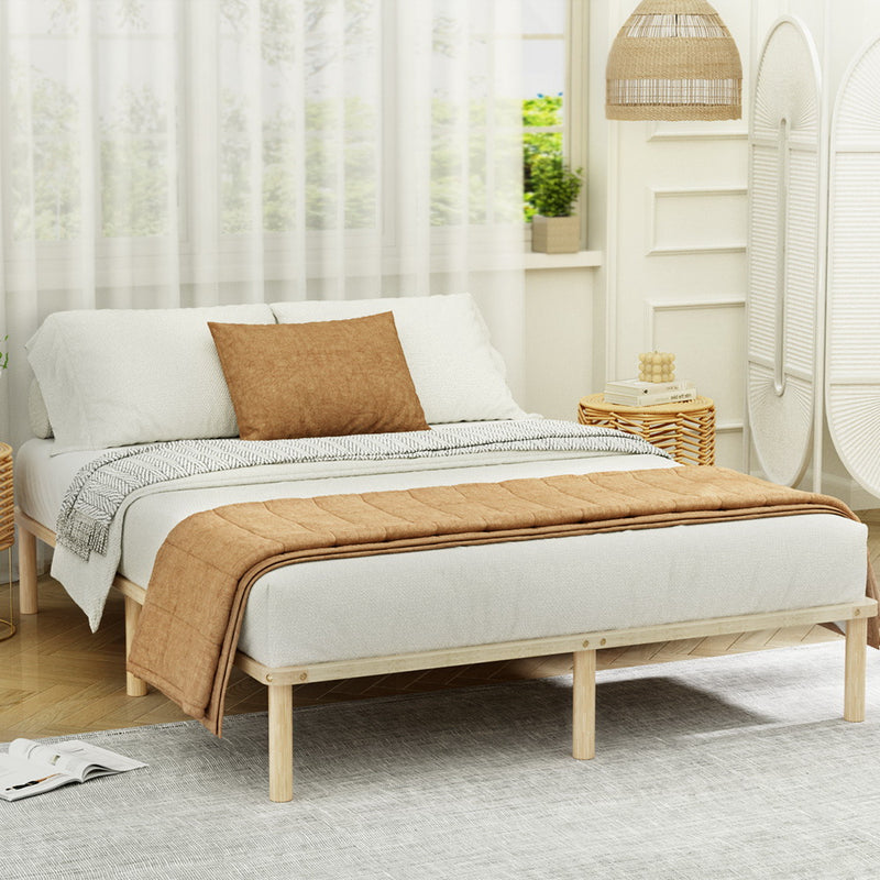 Amba Minimalist Queen Wooden Bed Frame Pine in natural finish with simple design in a bright bedroom setting