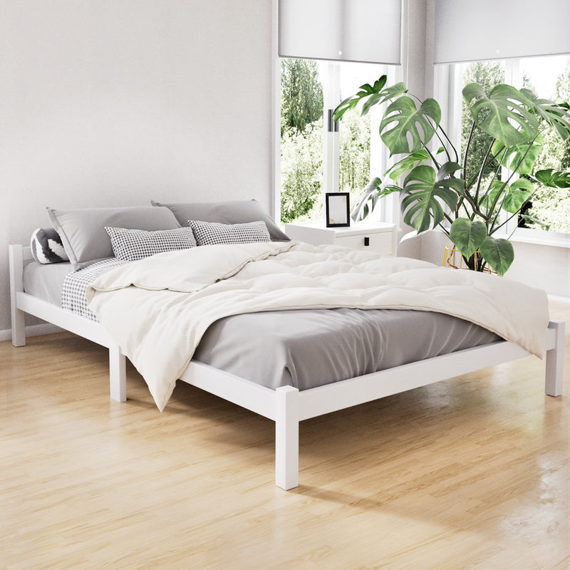 Gibson Wooden Double Bed Frame White with solid pine wood, styled with gray bedding in a bright bedroom setting