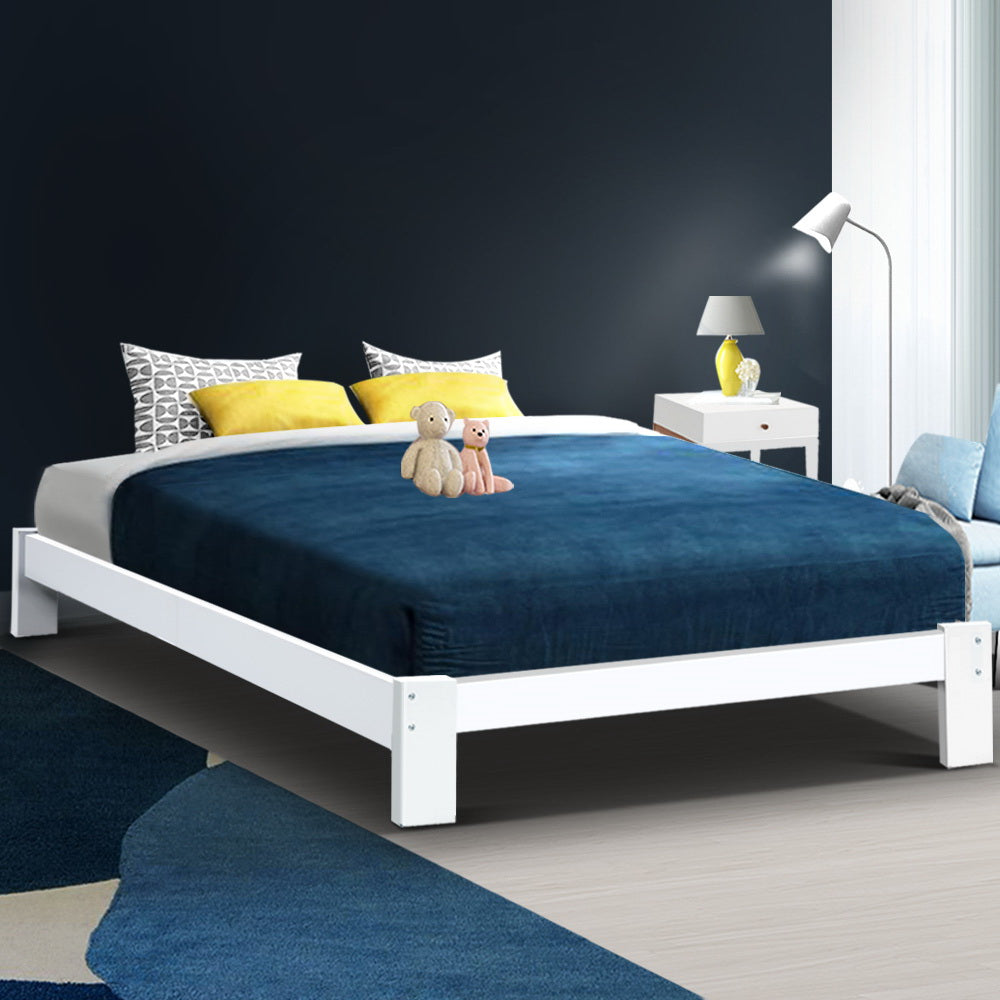 Fairy Wooden Double Bed Frame White with low solid pine wood design in modern bedroom setting with cushions and toys