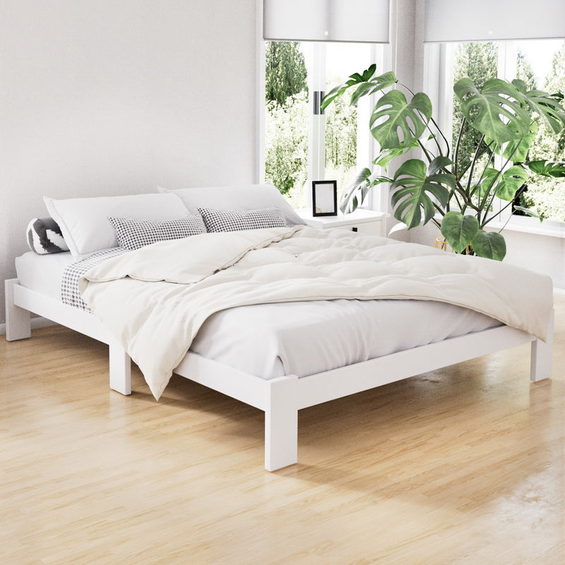 Fairy Wooden Double Bed Frame White in a bright bedroom setting with bedding and indoor plants nearby