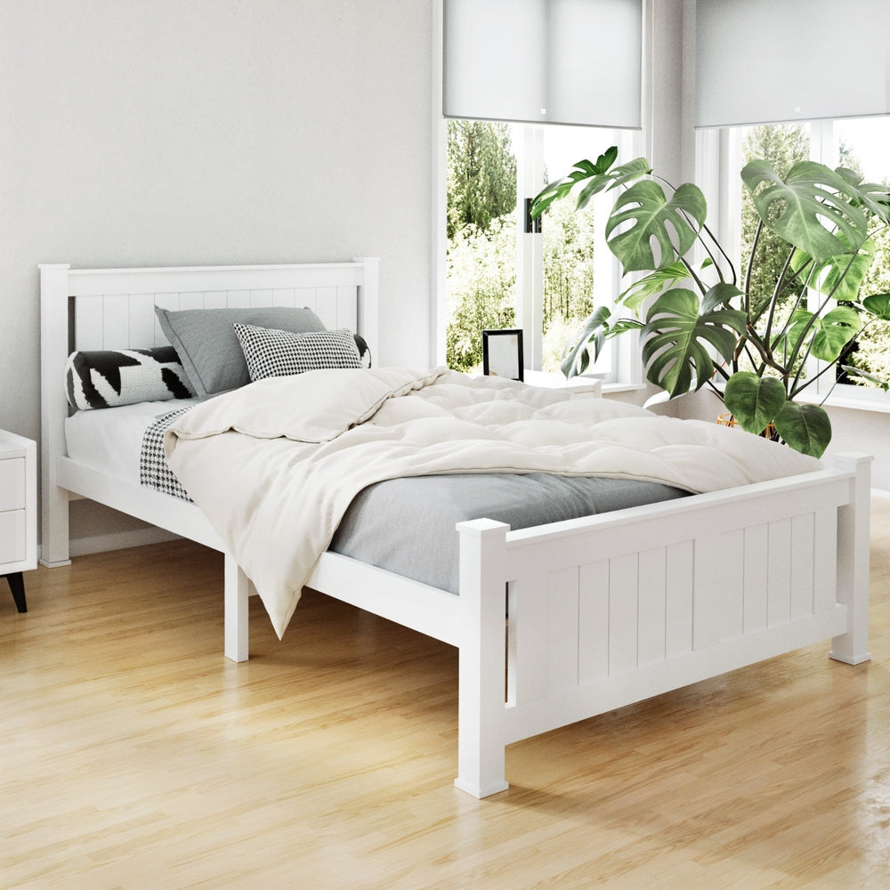 Cottesloe Wooden King Single Bed White with solid pine frame, slatted base, styled in a modern bedroom with plants and natural light