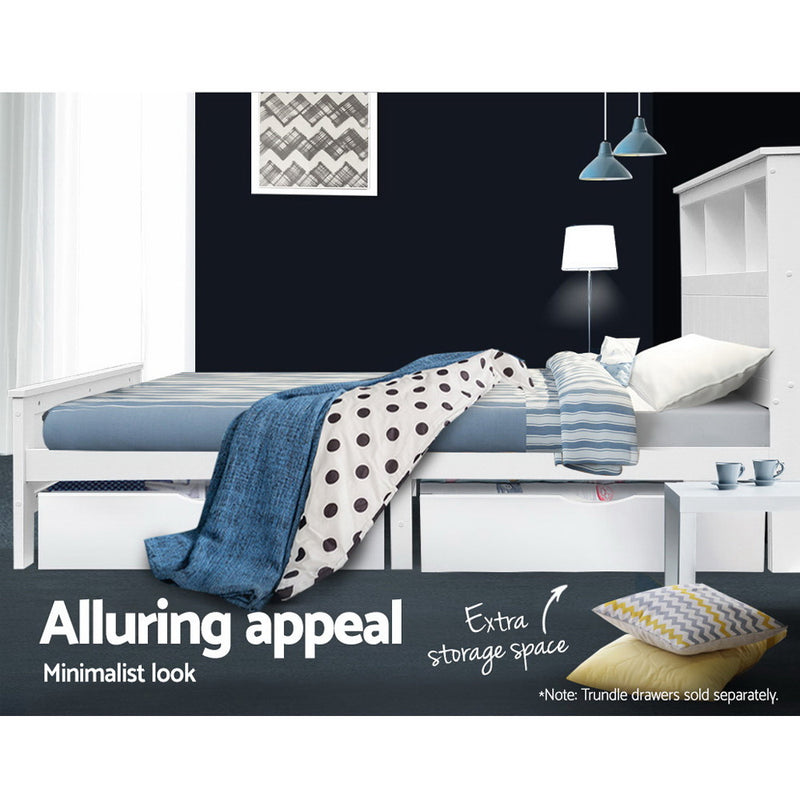 Kids Conqueror Wooden King Single Bed Frame with Shelving White in bedroom setting with bedding and extra storage space