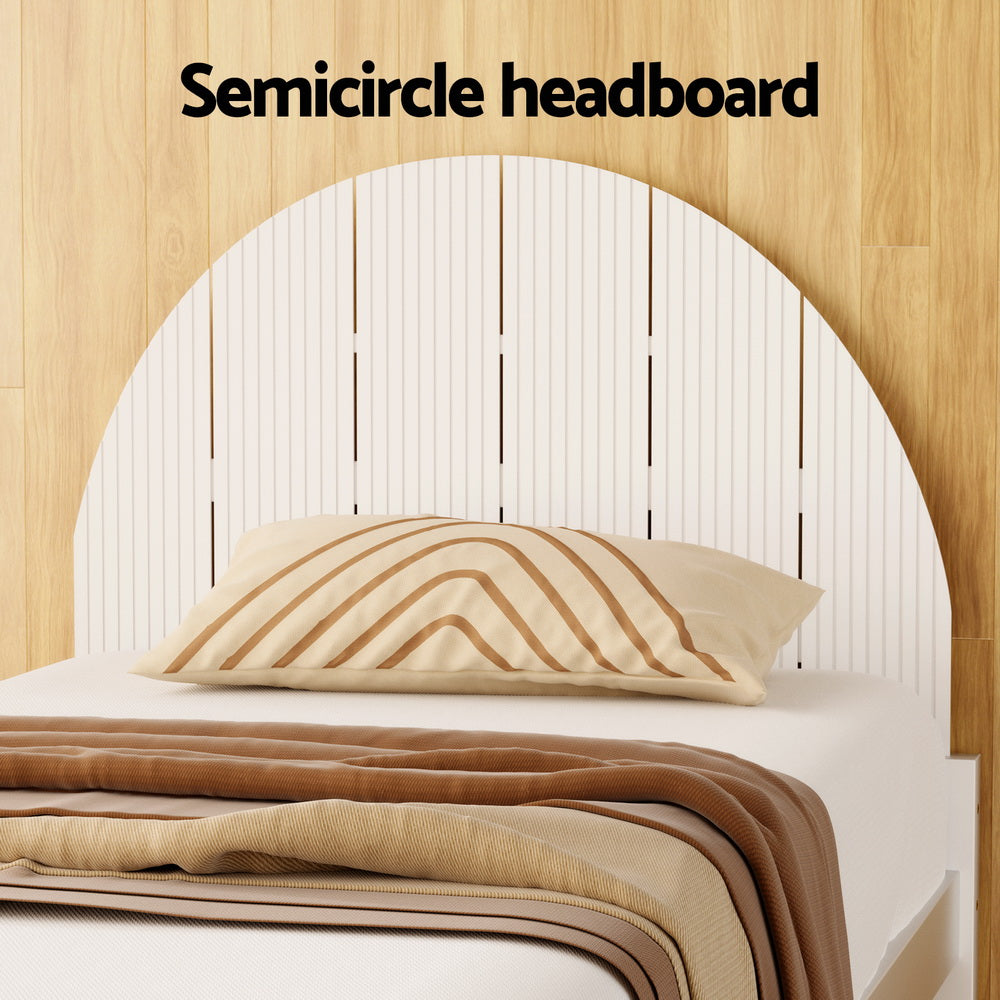 Daly Single Wooden Bed Frame White with unique semicircle headboard and beige-striped pillow on neutral bedding
