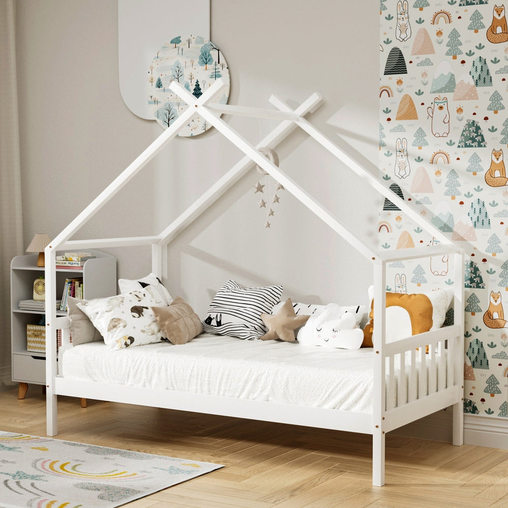 Single Size House Bed Frame for Kids – Montessori Style (White) with decorative pillows in a child's bedroom setting