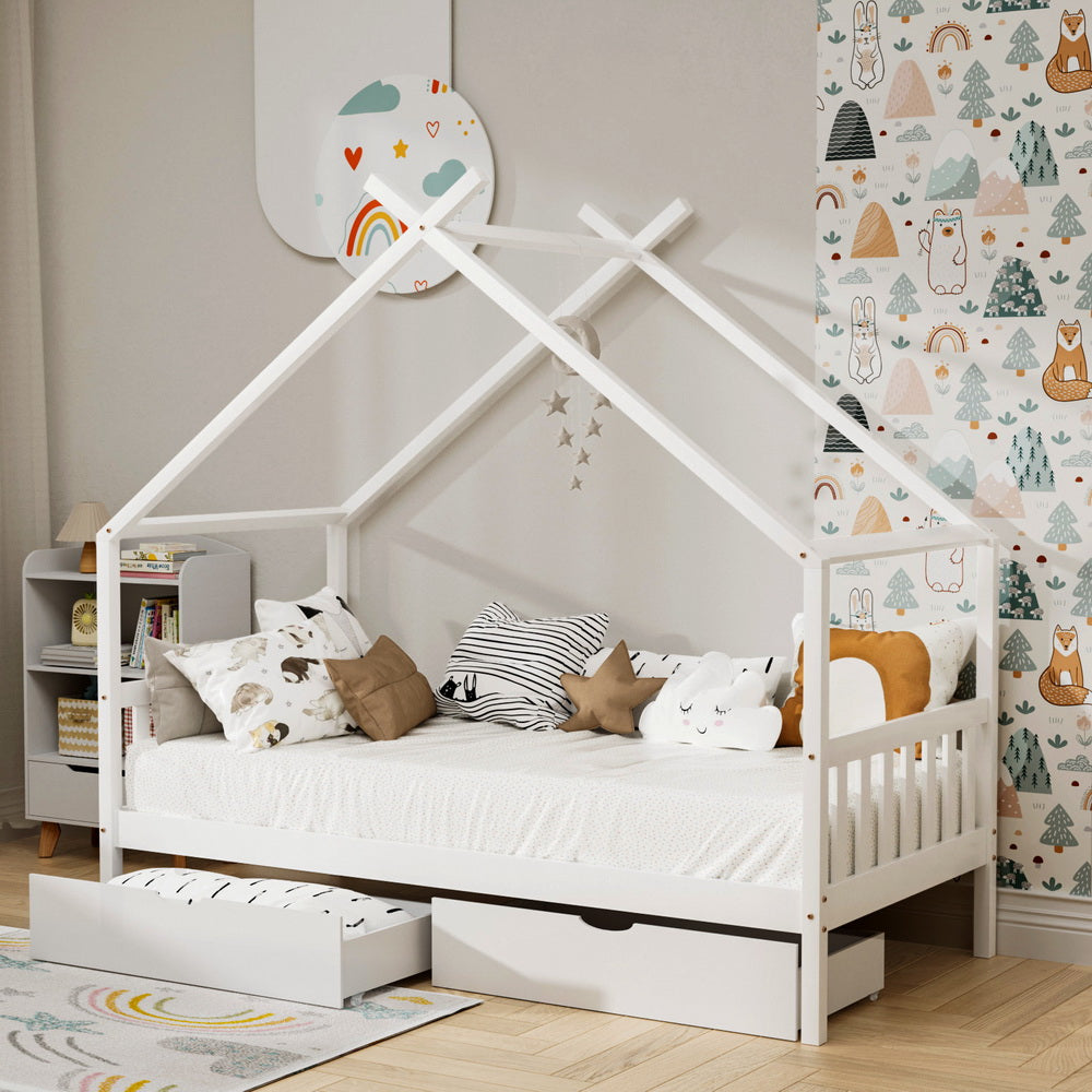 Single Size House Bed Frame with Storage Drawers – Montessori Style (White) in a child's bedroom with pillows and star decor