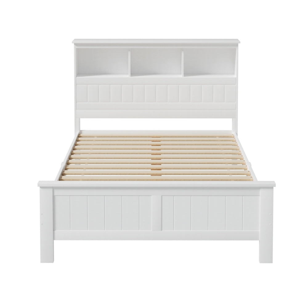 Flinders White Pine Storage Bed Frame – Double with white finish, wooden slats, and built-in shelving headboard in bright bedroom setting