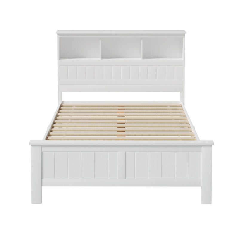 Flinders White Pine Storage Bed Frame – Double with white finish, wooden slats, and built-in shelving headboard in bright bedroom setting