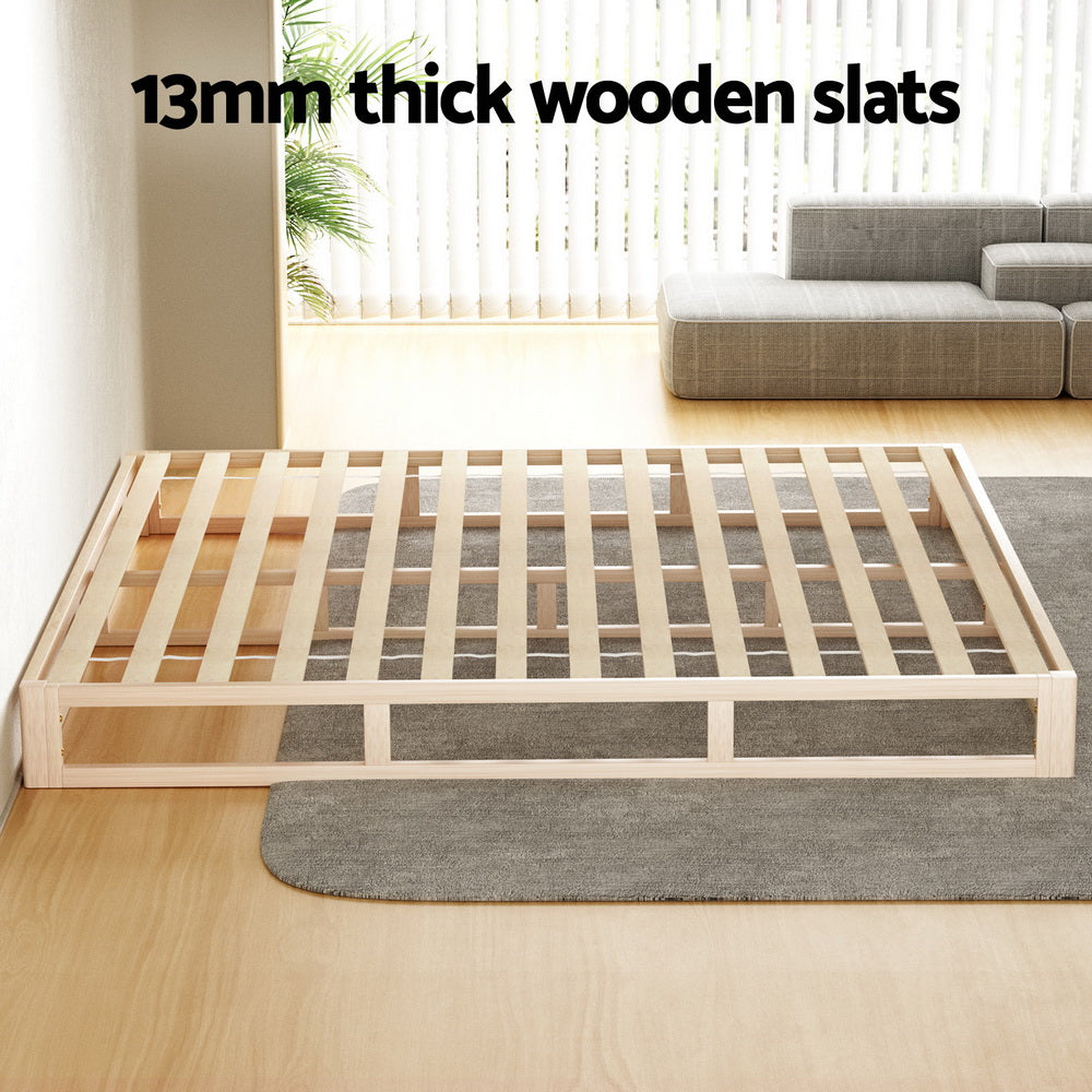 Kalam Minimalist Solid Pinewood Bed Frame - King with 13mm thick wooden slats in a bright modern room setting