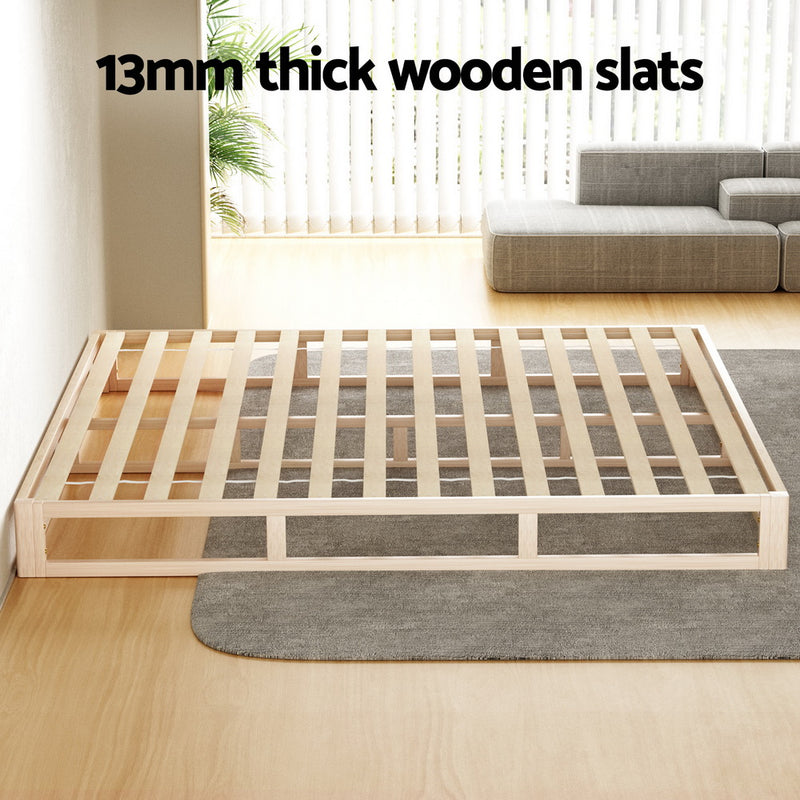 Kalam Minimalist Solid Pinewood Bed Frame - King with 13mm thick wooden slats in a bright modern room setting