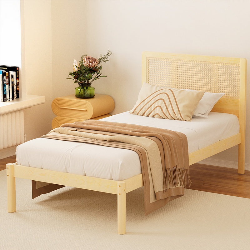 Rita Rattan Single Wooden Bed Frame Pine with rattan headboard, white bedding, beige throw, and decorative pillows in a bedroom setting
