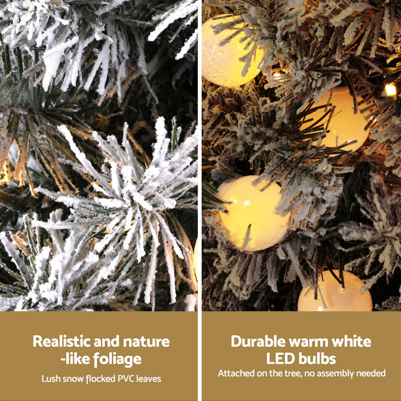 Close-up of Christmas Tree 1.2M Potted Snowy Xmas Tree showing realistic snowy foliage and warm white LED bulbs.