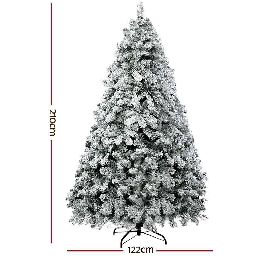 7FT / 2.1M Snow Flocked Christmas Tree – 859 Tips with full PVC branches and sturdy metal stand on white background