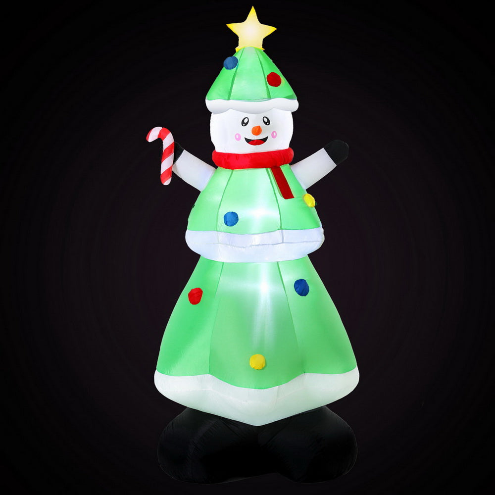 Christmas Inflatable Snowman Tree 2.75M Height LED Decorations Illuminated with candy cane and star topper against black background