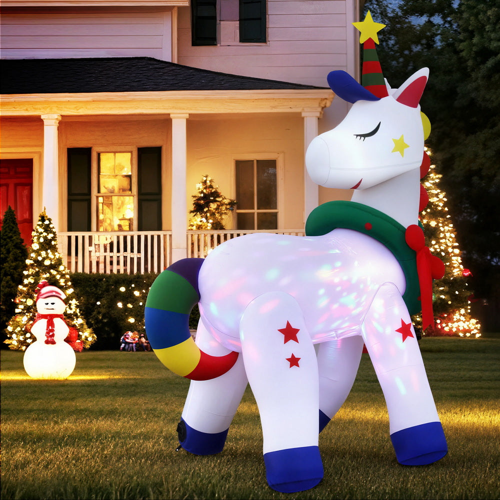 Christmas Inflatable Unicorn 1.8M Tall Outdoor Decorations Illuminated with colorful LED lights on a lawn in front of a house