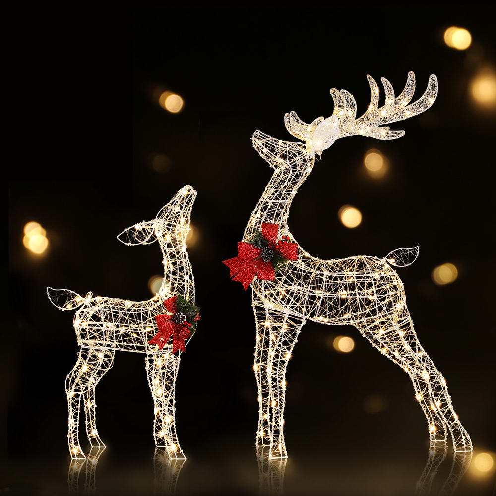 2 PCS Christmas Lights 170 LED Fairy Light Reindeer Decorations with red bow accents, glowing warmly against dark background