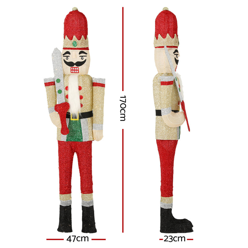 Christmas Lights 170cm Nutcracker 180 LED Fairy Light Decorations shown front and side with red, green, and gold accents.